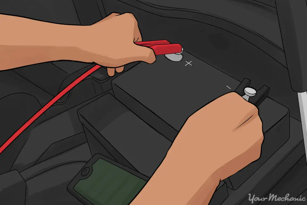 person disconnect car battery