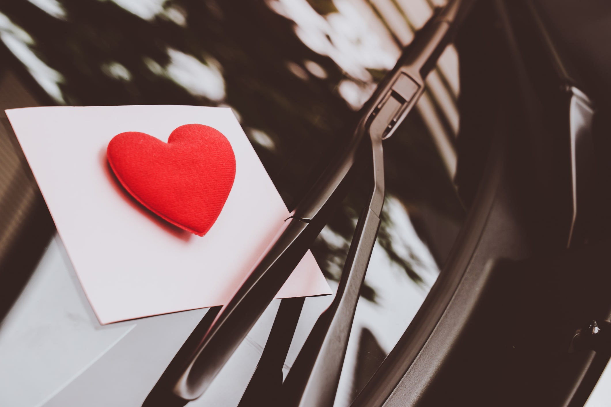 Valentine's Day card on car windshield