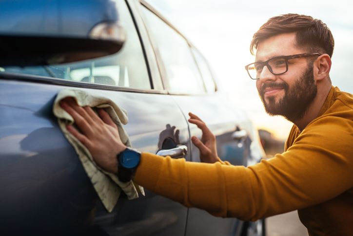 Man polishing his car