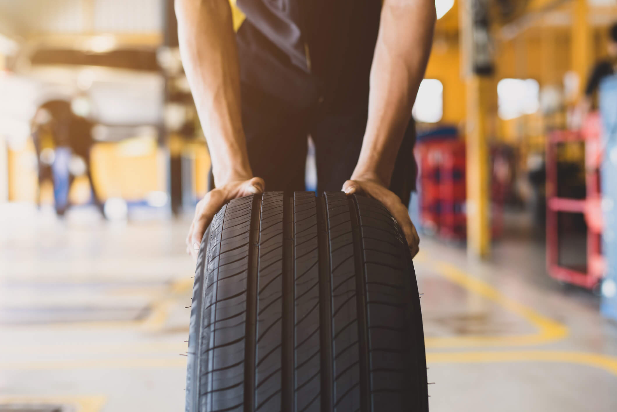 Replacing tire at workshop