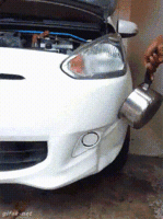 use hot water to fix car dent
