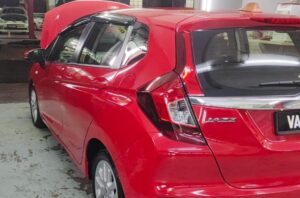 honda jazz from behind in detailing shop